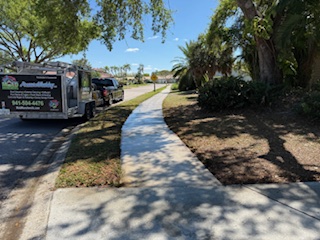 Mold Munchers pressure washing truck on residential job — Sarasota FL