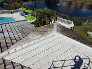Tile roof soft wash cleaning in progress — Sarasota FL