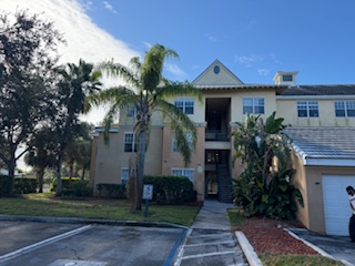 Commercial apartment building before pressure washing — Sarasota FL