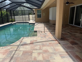 Pool deck pavers after cleaning and sealing — Sarasota FL