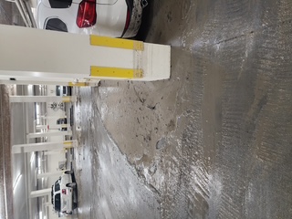Parking garage columns and floor pressure washing — Sarasota FL