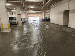 Parking garage pressure washing in progress — Sarasota FL