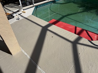 Concrete pool deck after pressure washing — Sarasota FL