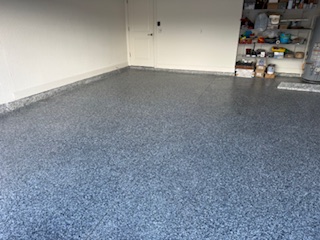 Garage floor after epoxy flake coating — Sarasota FL