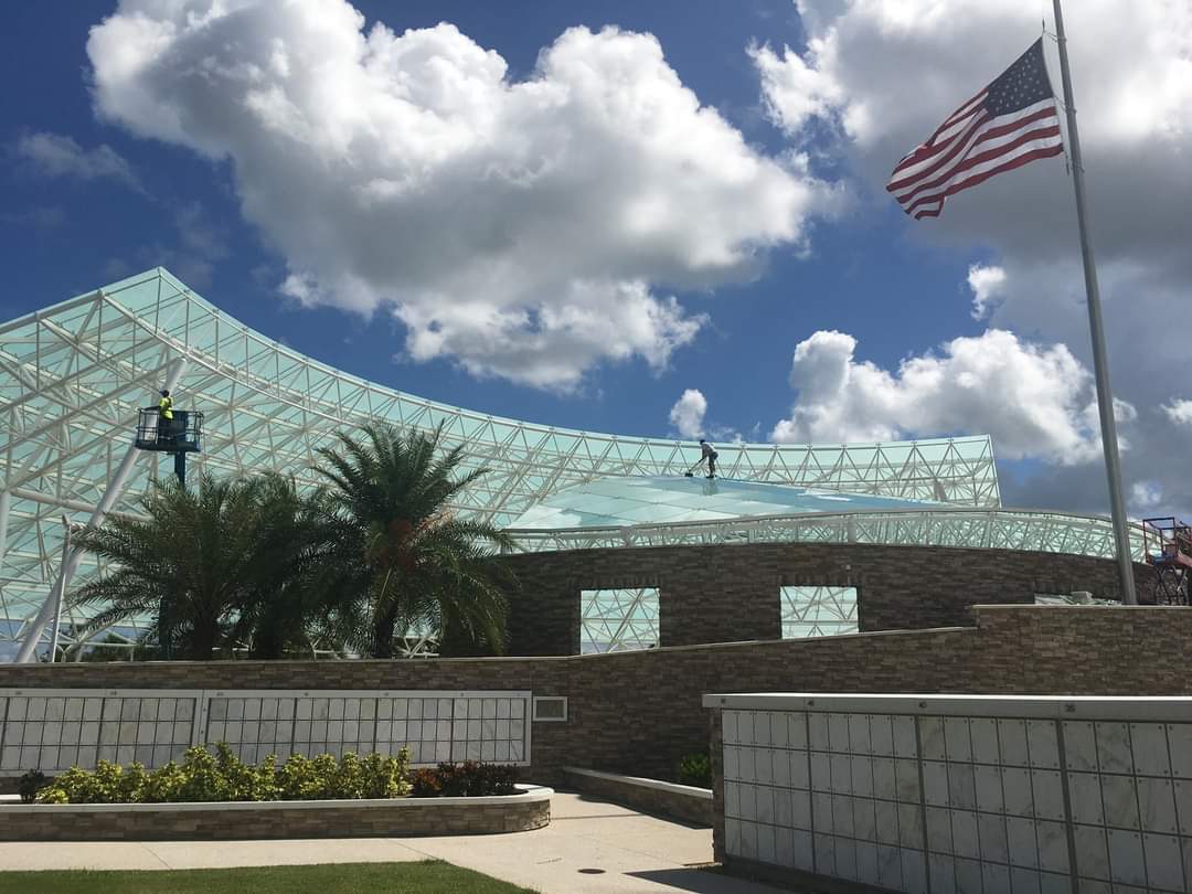 Sarasota National Cemetery glass amphitheater pressure washing — Mold Munchers